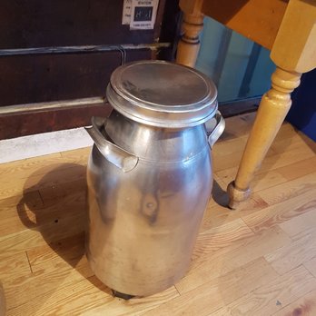 Beecher's Handmade Cheese - Milk can stool. So cute - Cheese Shops Near Me - Seattle, Washington