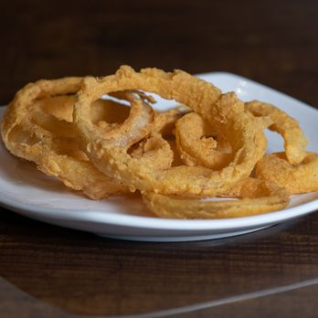 On A Bun - Freshly battered onions rings are always gluten free - Burgers Near Me - Birmingham, Alabama