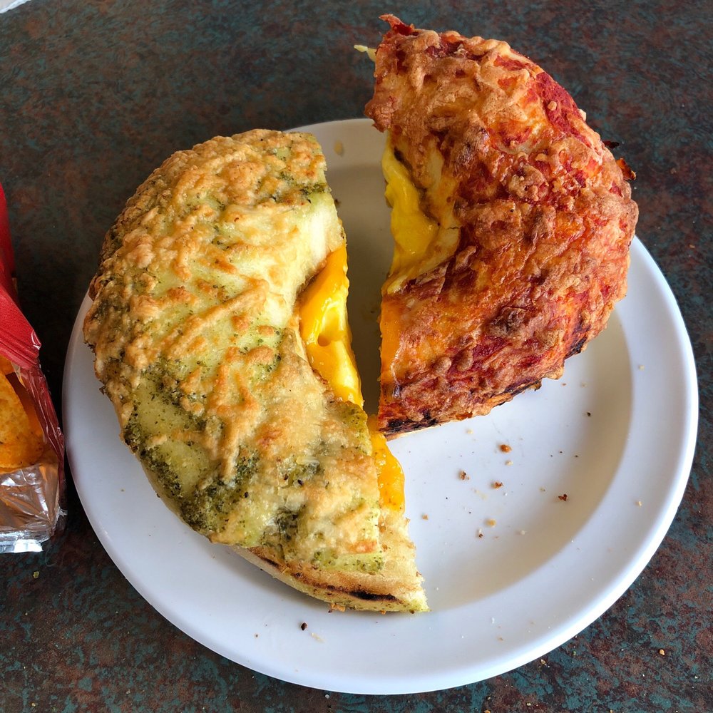 Half Pesto Parmesan East Coast Eggel and half Pizza East Coast Eggel. Half Pesto Parmesan East Coast Eggel and half Pizza East Coast Eggel.