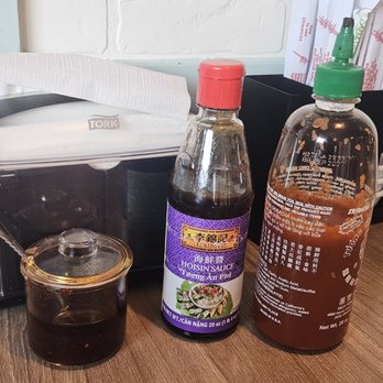 26 Viet Cafe - Condiment Array - the chili oil is unique for a Vietnamese restaurant. - Vietnamese Near Me - Pasadena, California