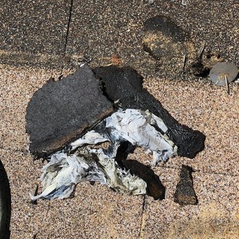 Clark Roofing - Plastic bag found under the shingles covering the hole. - Roofing Near Me - Pompano Beach, Florida Clark Roofing - Plastic bag found under the shingles covering the hole. - Roofing Near Me - Pompano Beach, Florida