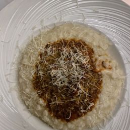 Risotto and ragu I took a fork full before I took the picture. Risotto and ragu I took a fork full before I took the picture.