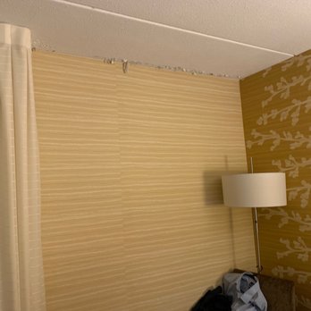 Fairfield Inn Burlington Williston - Closer view of chipping ceiling paint. The rug below was also damp. - Hotels Near Me - Williston, Vermont Fairfield Inn Burlington Williston - Closer view of chipping ceiling paint. The rug below was also damp. - Hotels Near Me - Williston, Vermont