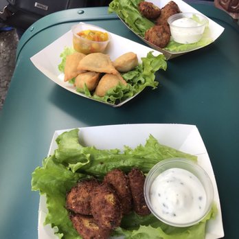 Mr. Kamal's - Samosas with mango salsa and falafels with tzatziki sauce - Indian Near Me - Orlando, Florida Mr. Kamal's - Samosas with mango salsa and falafels with tzatziki sauce - Indian Near Me - Orlando, Florida