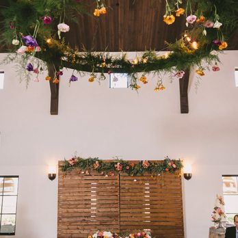 Petal Town Flowers - Sweetheart table, backdrop + chandelier. - Florists Near Me