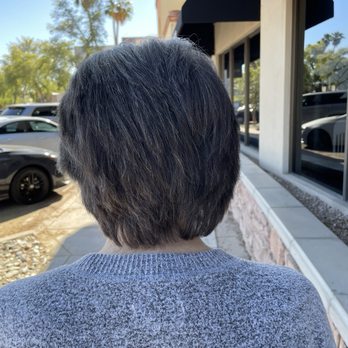 Saints & Scissors Salon - Blow dry and feather cut from prior long hair curl style - Hair Salons Near Me - Scottsdale, Arizona Saints & Scissors Salon - Blow dry and feather cut from prior long hair curl style - Hair Salons Near Me - Scottsdale, Arizona