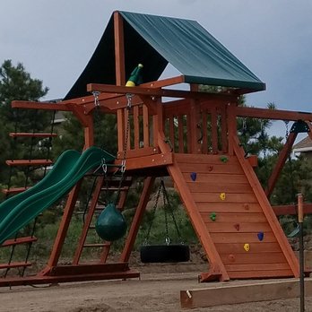 Ultimate Playsets - A playset with a tire swing, rope ladder, swing set, and slide - Playsets Near Me - Englewood, Colorado Ultimate Playsets - A playset with a tire swing, rope ladder, swing set, and slide - Playsets Near Me - Englewood, Colorado