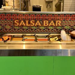 Charittos - Salsa bar. Five salsas, lime slices, pickled carrots & jalapeños. Fresh daily.