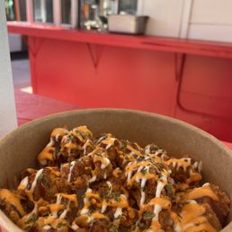 a bowl of food on a table a bowl of food on a table