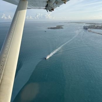 Key West Seaplane Adventures - Flying by the ferry that left at the same time but will arrive 3 hrs later - Tours Near Me - Key West, Florida Key West Seaplane Adventures - Flying by the ferry that left at the same time but will arrive 3 hrs later - Tours Near Me - Key West, Florida