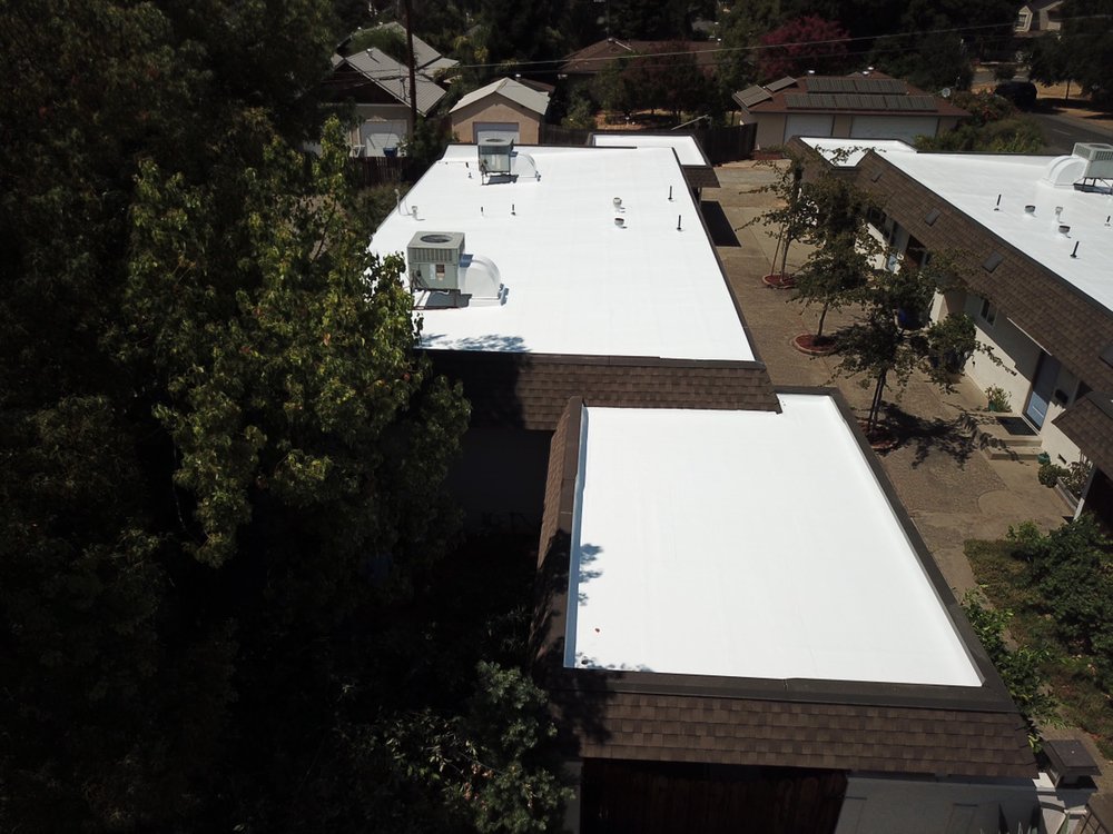 Slide of Flat Roof Pros