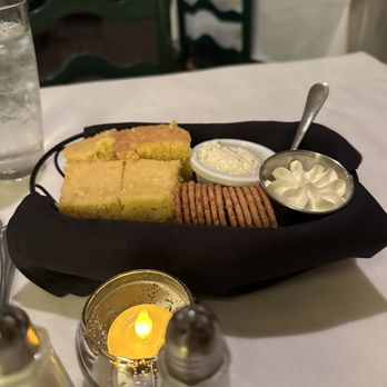 The Parson's Table - Cornbread and crackers with whipped butter and cheese spread - Steakhouses Near Me - Little River, South Carolina The Parson's Table - Cornbread and crackers with whipped butter and cheese spread - Steakhouses Near Me - Little River, South Carolina
