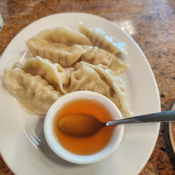 Renu Nakorn - Steamed wontons skins stuffed with ground chicken, and vegetable, served with homemade sweet and sour sauce - Thai Near Me - Norwalk, California