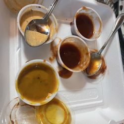 Pop's Smoke Shack - Array of homemade bbq sauce options including garlic, smoke shack, whisky peach and mustard.