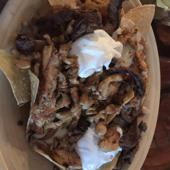 Fiesta Mexico - Nacho Santa Fe with chicken strips steak cheese refried beans and sour cream! - Mexican Near Me - Harrisburg, Pennsylvania Fiesta Mexico - Nacho Santa Fe with chicken strips steak cheese refried beans and sour cream! - Mexican Near Me - Harrisburg, Pennsylvania