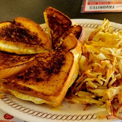 Waffle House - Egg and cheese sandwiches on white, plus hashbrowns smothered and covered.