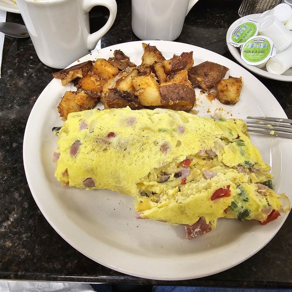 Bagelmania Restaurant - Denver omelet with potatoes - Bagels Near Me - Sunrise, Florida Bagelmania Restaurant - Denver omelet with potatoes - Bagels Near Me - Sunrise, Florida