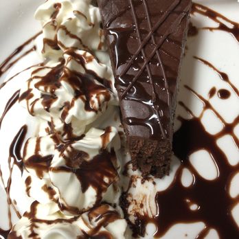 ROAM Cafe - Incredible, star-studded flourless chocolate cake! - New American Near Me - Rochester, New York ROAM Cafe - Incredible, star-studded flourless chocolate cake! - New American Near Me - Rochester, New York