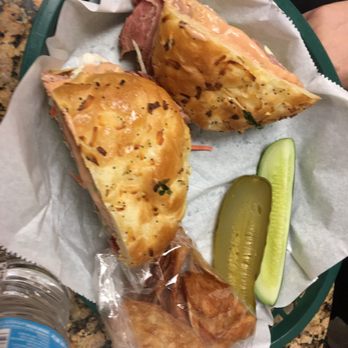 Front Page Deli - Corned beef on an onion roll with slaw and Russian dressing NEW and old pickle - Delis Near Me - Oak Park, Michigan