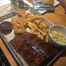 Steakhouse Combo- Half ribs and chicken crispers, fries and Mac & cheese Steakhouse Combo- Half ribs and chicken crispers, fries and Mac & cheese