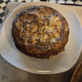 El Portalón - Potato omelet with poached onions - Spanish Near Me - Barcelona, B El Portalón - Potato omelet with poached onions - Spanish Near Me - Barcelona, B