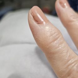 TT Nails & Spa - Nail sides not cleaned or shaped or polish to edge, yet cuticles covered with polish!