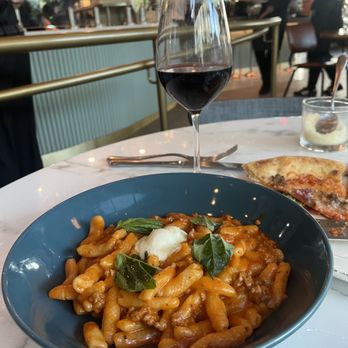 Marina - Cavatelli & Italian sausage House-made sausage, tomato sauce basil, house-made ricotta & goat cheese. - Italian Near Me - Pasadena, California Marina - Cavatelli & Italian sausage House-made sausage, tomato sauce basil, house-made ricotta & goat cheese. - Italian Near Me - Pasadena, California