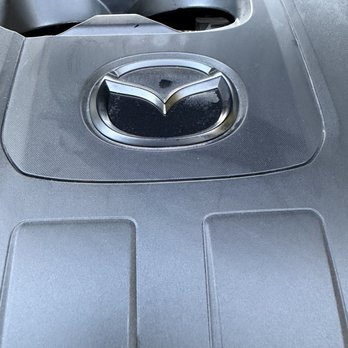 Mazda Roseville - engine cover is covered in oil - Car Dealers Near Me - Roseville, California Mazda Roseville - engine cover is covered in oil - Car Dealers Near Me - Roseville, California