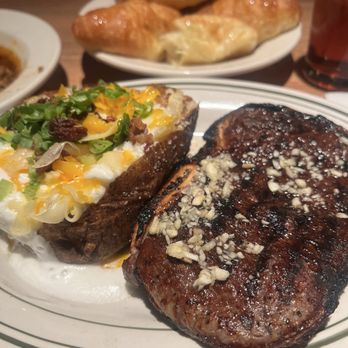 Joey D's Oak Room - Bone-In Ribeye and Loaded Baked Potato - Steakhouses Near Me - Atlanta, Georgia