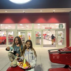 Target - Kids in front of Orange County Target happy with their toys.