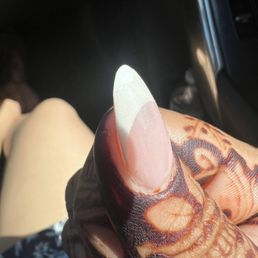 Top coat peeling towards tip of nail Top coat peeling towards tip of nail