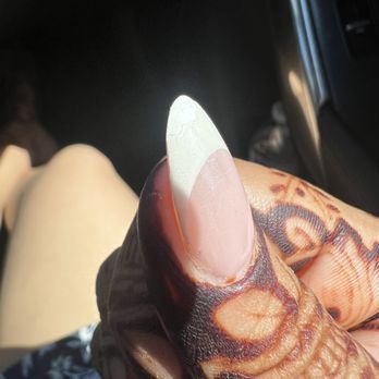 La' VOgue Nails & Spa - Top coat peeling towards tip of nail - Nail Salons Near Me - Oak Brook, Illinois La' VOgue Nails & Spa - Top coat peeling towards tip of nail - Nail Salons Near Me - Oak Brook, Illinois