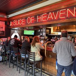 Mystic Pizza - Bar area where you can order slices