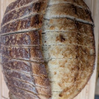 Mystique's Bistro - We sliced up the bread. The heels of the load were devoured with fresh homemade butter before this photo was taken. Sorry not sorry. - Bakeries Near Me Mystique's Bistro - We sliced up the bread. The heels of the load were devoured with fresh homemade butter before this photo was taken. Sorry not sorry. - Bakeries Near Me