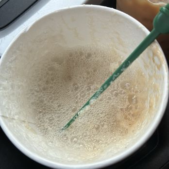 Starbucks - 1/2 of a venti latte that was handed to me like this  This is theft - Coffee & Tea Near Me - Highland, California