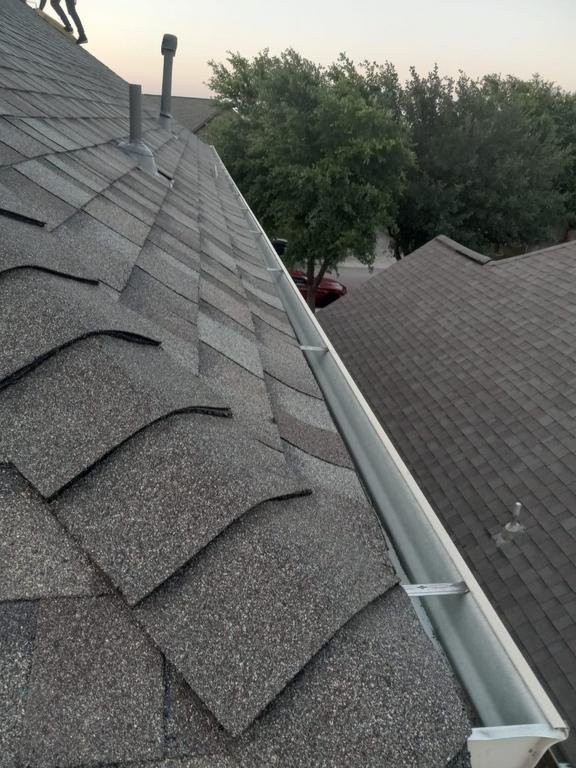 Slide of Truly Roofing & Construction