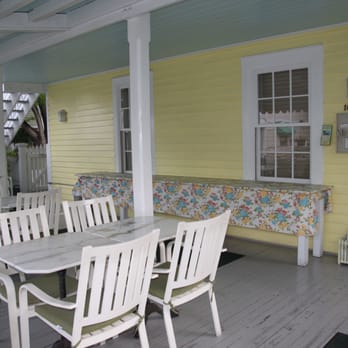 Duval Gardens - front porch where breakfast is served, overlooking Duval - Bed & Breakfast Near Me - Key west, Florida Duval Gardens - front porch where breakfast is served, overlooking Duval - Bed & Breakfast Near Me - Key west, Florida
