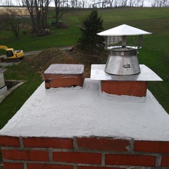 The Chimney Guy - Crown seal plate off in-used chimney flue (8×8 clay tile)top plate And rain cap on a stainless steel liner - Chimney Sweeps Near Me - Fairchance, Pennsylvania The Chimney Guy - Crown seal plate off in-used chimney flue (8×8 clay tile)top plate And rain cap on a stainless steel liner - Chimney Sweeps Near Me - Fairchance, Pennsylvania