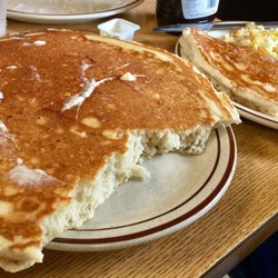 Lou's Diner - My husband ordered eggs, sausage and hash browns. The menu offered a pancake or toast, he chose the pancake.