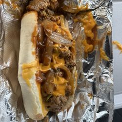 TJs ToGo - The Carroll. I call It the Messy Carol. Award winning meatloaf sautéed onions, cheese, and a delicious hoagie.