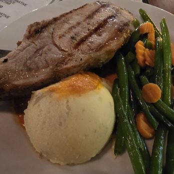 The Comedy & Magic Club - Thick cut pork chop. - Comedy Clubs Near Me - Hermosa Beach, California