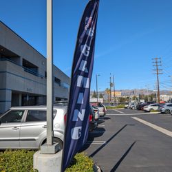 We Can Be Heroes Comics - The flag to the entryway of the shop