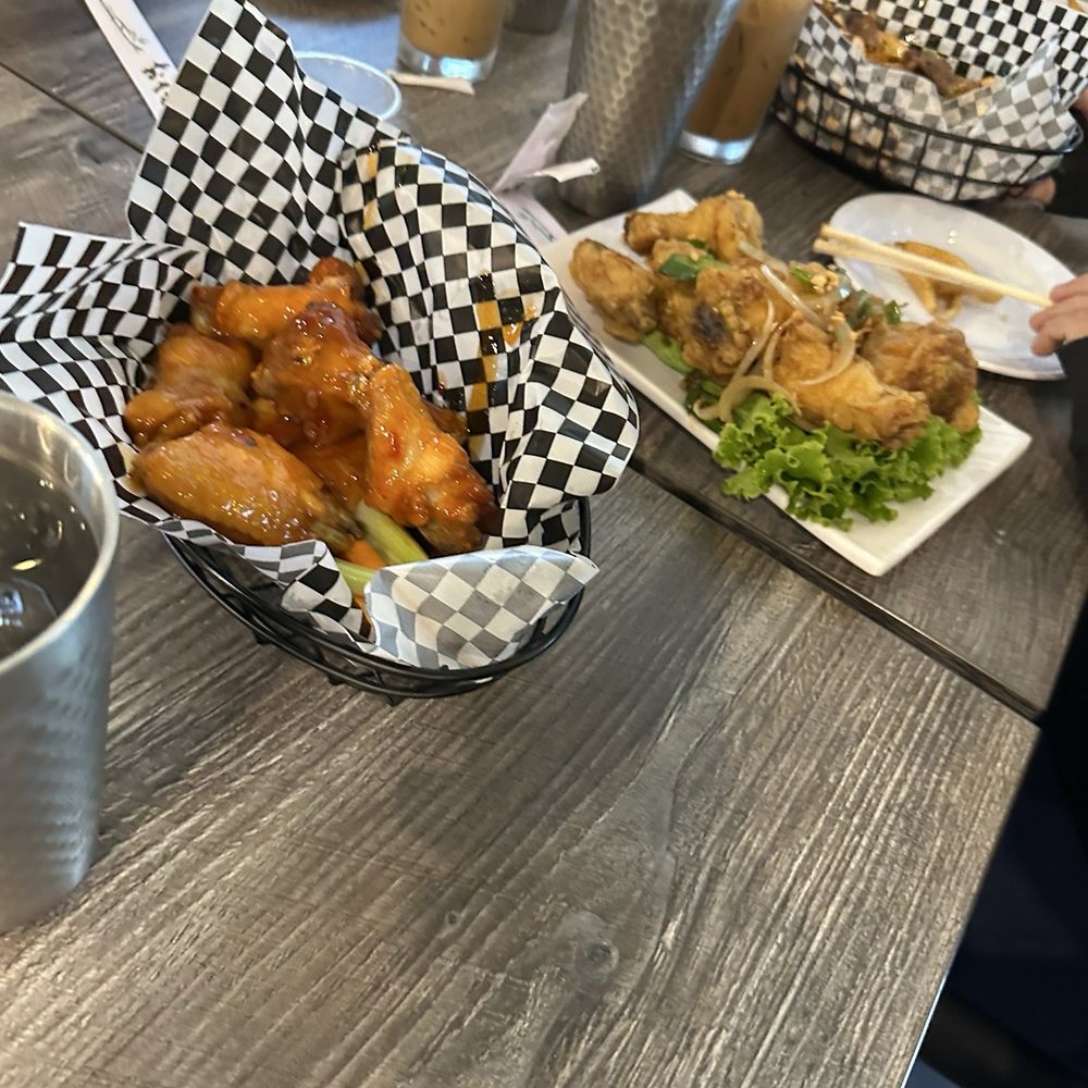 Pho Leo & Grill - Wings. The spicy was like a 4/5 spicy. Nice and crisp. Vietnamese iced coffee was good. - Vietnamese Near Me - San Diego, California
