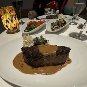 Slahal Steakhouse - New York Steak with asparagus and wild mushrooms - Salad Near Me - Tacoma, Washington Slahal Steakhouse - New York Steak with asparagus and wild mushrooms - Salad Near Me - Tacoma, Washington