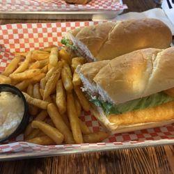 Copperheads Pub - Beer battered fish sandwich with fries and coleslaw.