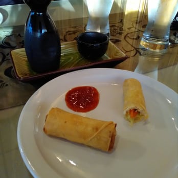 Yummy Thai - Friend chicken spring roll with sweet and sour sauce. Also a carafe of Sake' - Thai Near Me - Buffalo, New York Yummy Thai - Friend chicken spring roll with sweet and sour sauce. Also a carafe of Sake' - Thai Near Me - Buffalo, New York