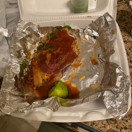 a piece of meat wrapped in foil