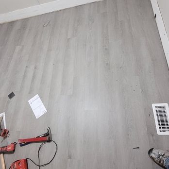 A guy and his tools - LVP Flooring after - Painters Near Me A guy and his tools - LVP Flooring after - Painters Near Me