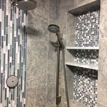 Italian Heritage Tile & Stone - Both shower heads have separate wands for that extra special spa treatment - General Contractors Near Me Italian Heritage Tile & Stone - Both shower heads have separate wands for that extra special spa treatment - General Contractors Near Me