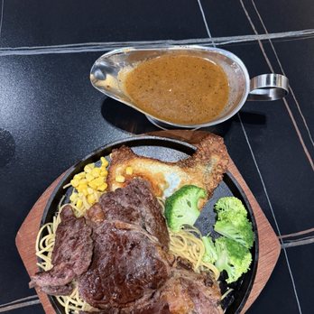 Cutting Board - 52.Sizzling Steak(10Oz) (was not sizzling - plate wasn't even hot) - Asian Fusion Near Me - Houston, Texas Cutting Board - 52.Sizzling Steak(10Oz) (was not sizzling - plate wasn't even hot) - Asian Fusion Near Me - Houston, Texas